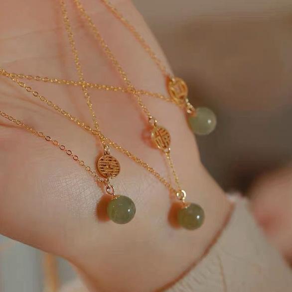 

Recommended Fortune and happiness symbol money Hetian jade necklace for women, collarbone chain, summer trendy versatile pendant, light luxury style Fu brand Hetian jade neck