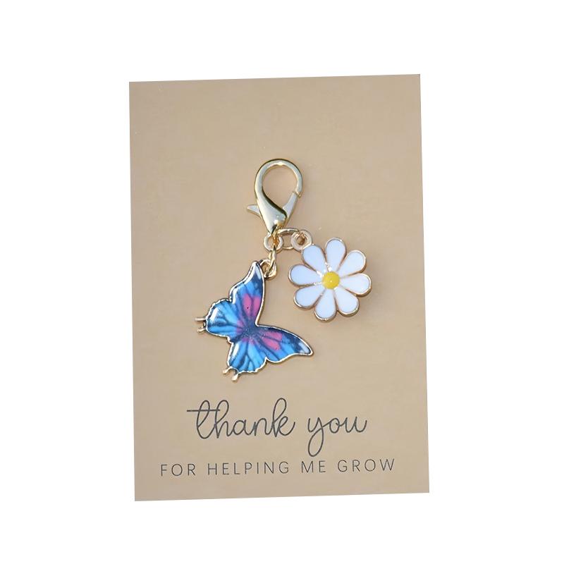 1 Stück DIY Geschenk Schmetterlingsdesign Anhänger Schlüsselanhänger Marker Metall Kreativität Schlüsselanhänger Party Gänseblümchen Niedlich