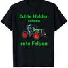 Black T Shirt Featuring Green Tractor and The German Phrase Real Heroes Drive Red Rims for Farming Fans Agricultural Laborers