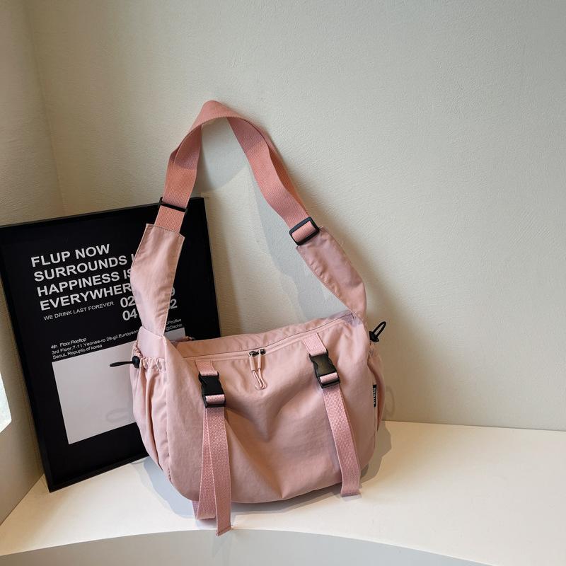 

Стильный и простой нишевый дизайн Большая вместимость сумка-тоут Студенческая легкая для поездок Модная повседневная сумка-мессенджер женская розовый