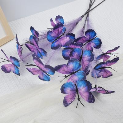 En konstgjord fjärilsgren som används för bröllop, hemmakontor, fester, för att dekorera vaser och i blomsterarrangemang