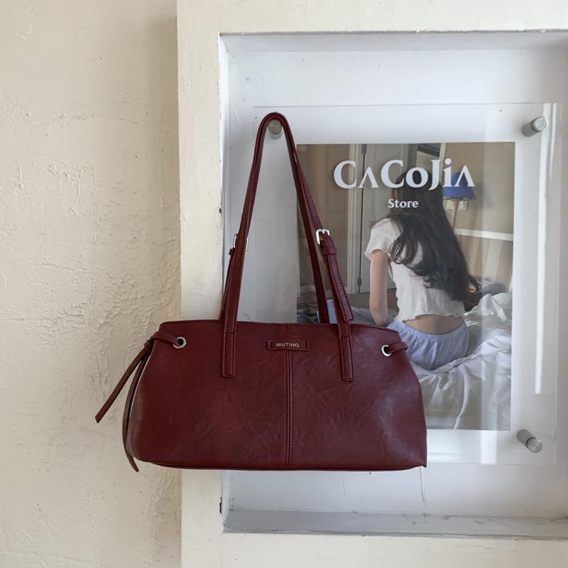 Einfacher Pendelverkehr Herbst und Winter neue Damenmode mit großer Kapazität Retro Unterarm-Schultertasche große Tasche