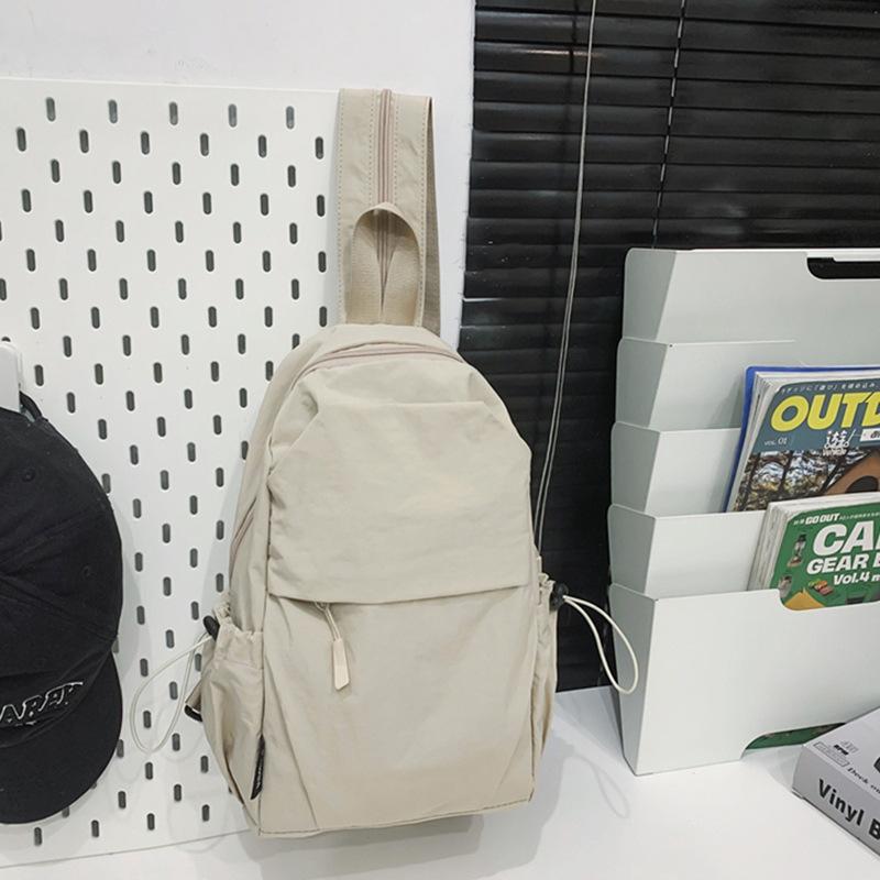 Schoolbag breast bag men and women outdoor travel travel lightweight small backpack mini mountaineering bag messenger bag lightweight backpack