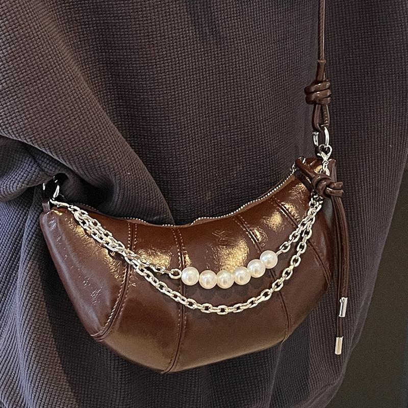 Nischen-Design-Tasche Damen Sommer Neue Mode Horn-Tasche Mode Knödel-Tasche Schulter-Umhängetasche