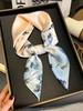 Low-key luxury womens headscarf is a must-have for spring and summer Imitation silk printed square scarf is fashionable 2024