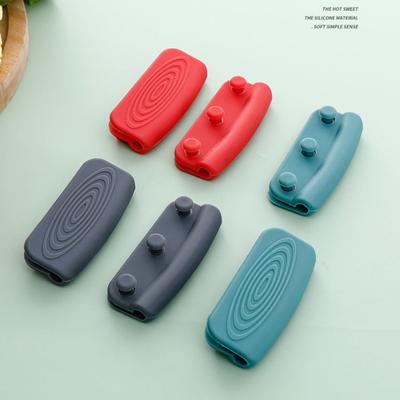 1 Paire Poignées de Manche de Casserole Souples Antidérapantes Résistantes à la Chaleur Réutilisables Conception à Boucle Anti-brûlure Silicone Gant pour Manche de Casserole Couvercle Poignées Cuisine
