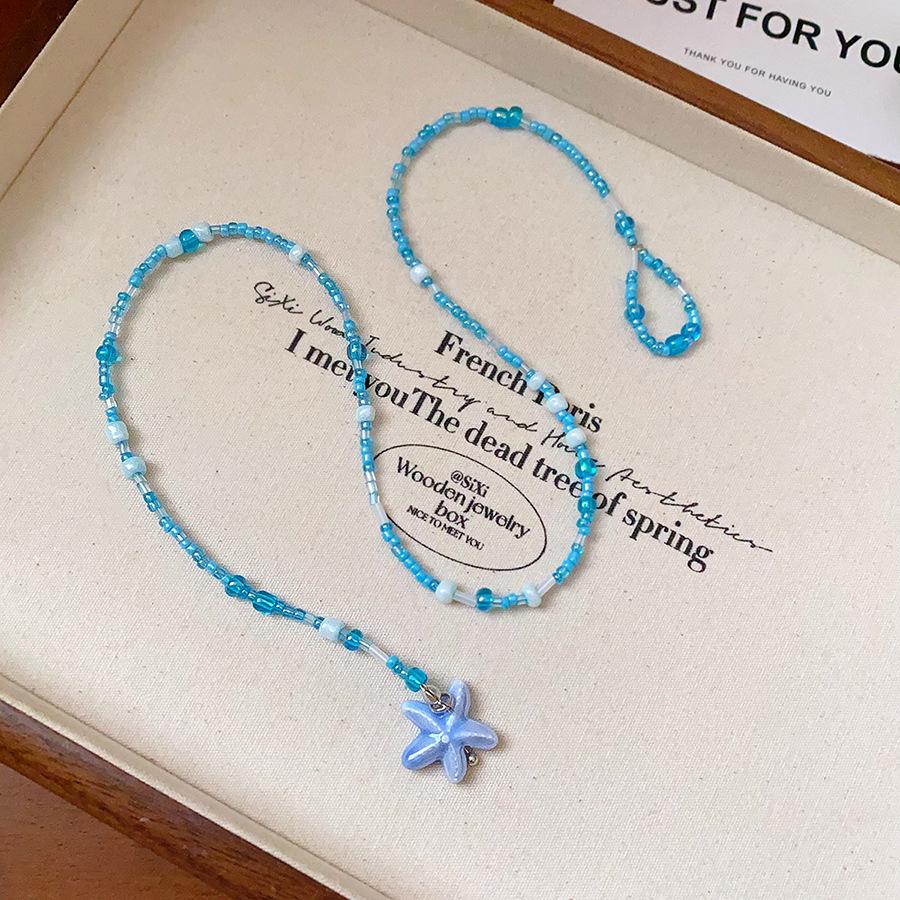 Retro Ethnic Heart Necklace: Wooden Flower Pendant Sweater Chain for Women