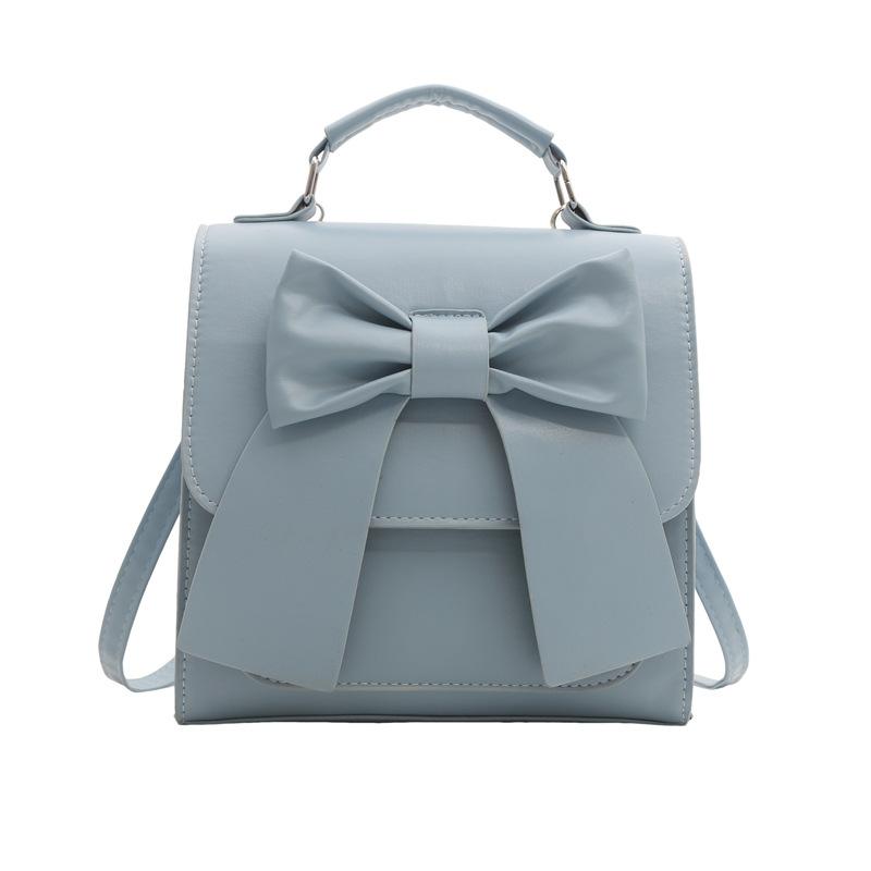 

Жіночий рюкзак із бантом із текстурою ніші 2024 року в новому стилі, проста портативна сумка через плече синій