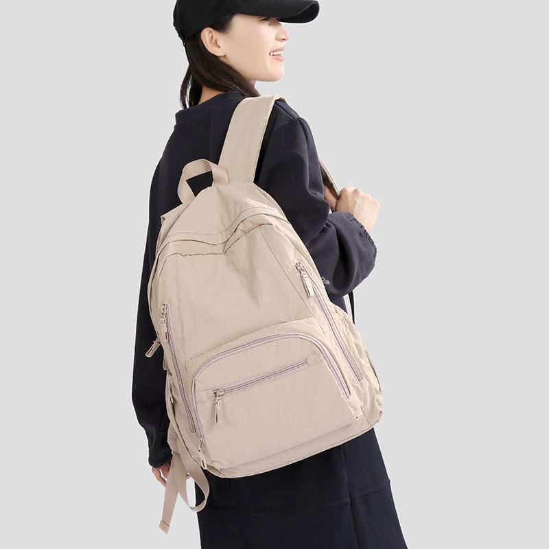 Ryggsäck i enfärgat dam lätt utomhusryggsäck stor kapacitet student skolväska