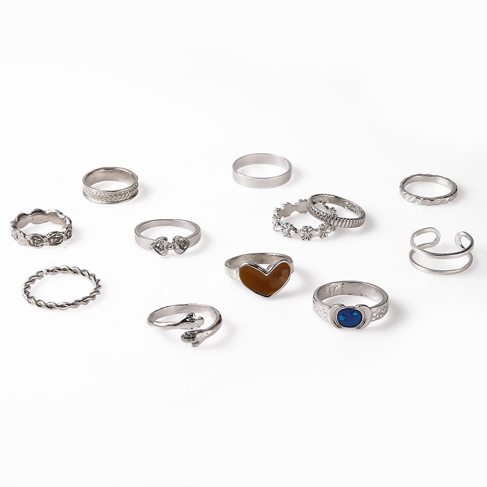 Fashionable Heart-Shaped Rings Set: Twisted Design with Micro-Inlaid Diamonds, 12 Pieces