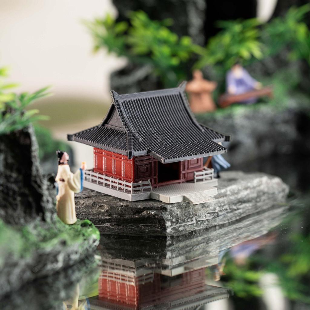 Model mikrokrajinky a bonsaje: Malebný starověký pavilon s kamennou skalkou a vodní nádrží