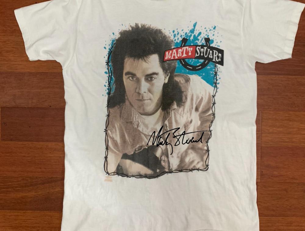 

Vintage Marty Stuart Super Star Heavy Cotton White All Size Unisex Shirt Unisex T-Shirt S