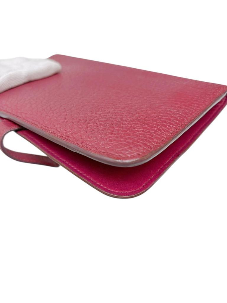 Použitá dlouhá peněženka Hermès Dogon GM v barvě vínová rubínová, stříbrné kování