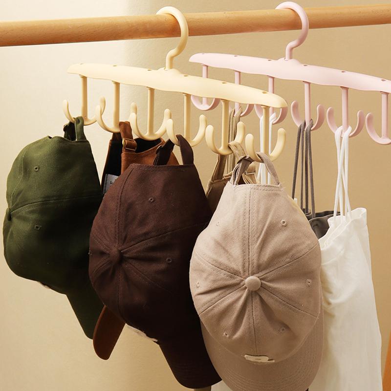 Multifunktionale Kleiderbügelständer unterstützen das kreisförmige Trocknen von Schals und Socken aus Kunststoff und sind Aufbewahrungsregale für Krawattengürtel und BHs