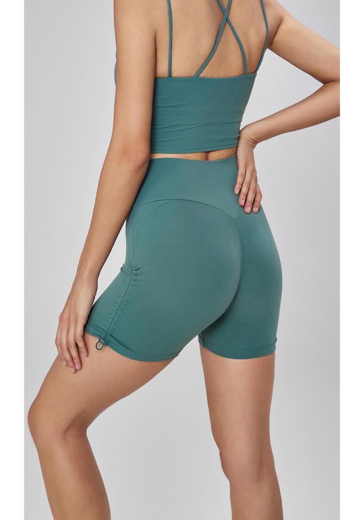 Bare-Feel High-Waisted Yoga Shorts: Butt-Lifting, Peach Drawstring, Three-Quarter Fitness Pants for Women.