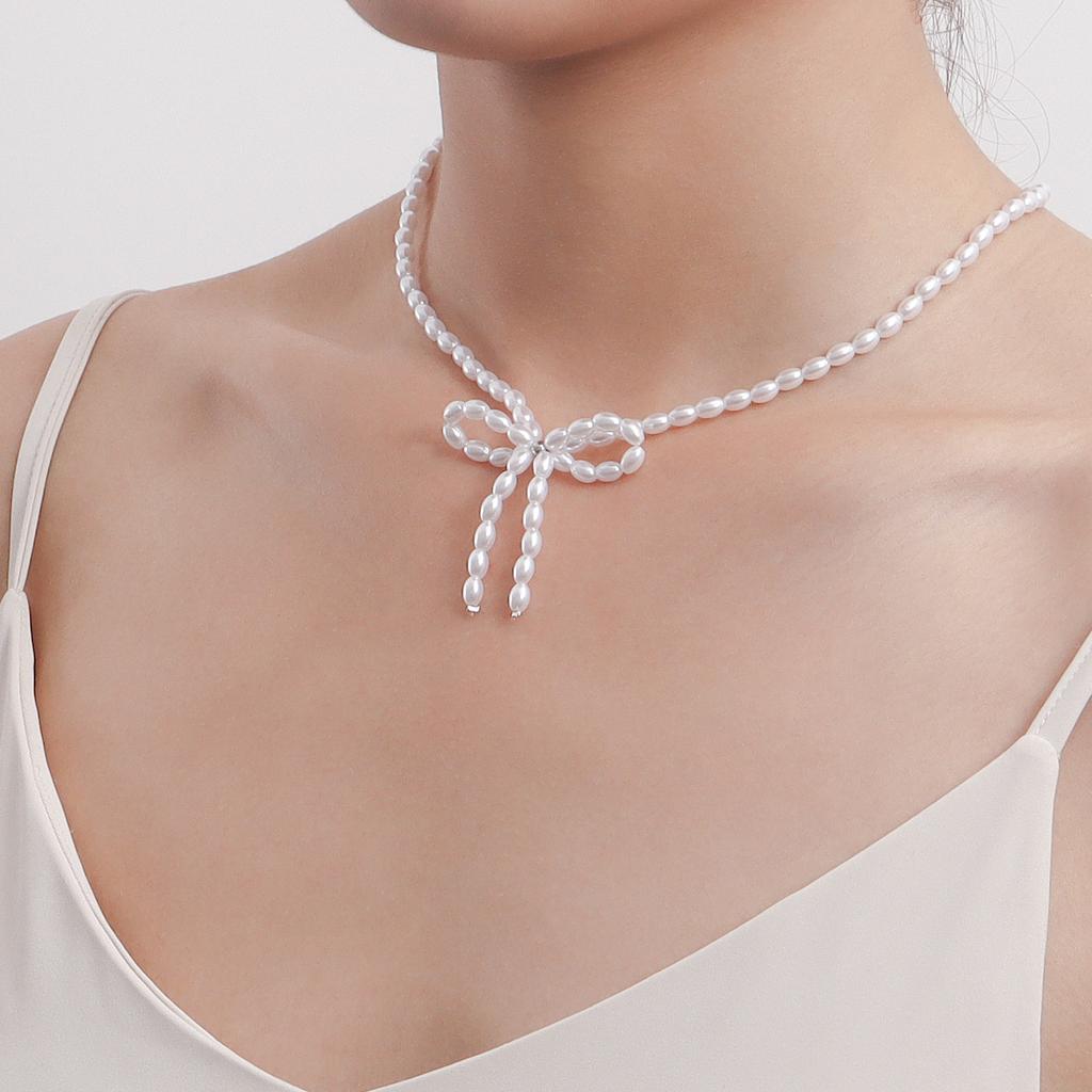 Jewelry choker bow imitation pearl necklace women's niche design sense light luxury beaded necklace
