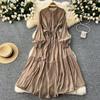 French retro elegant dress women's design sense single-breasted buckle loose waist straps show thin temperament knee-length dress
