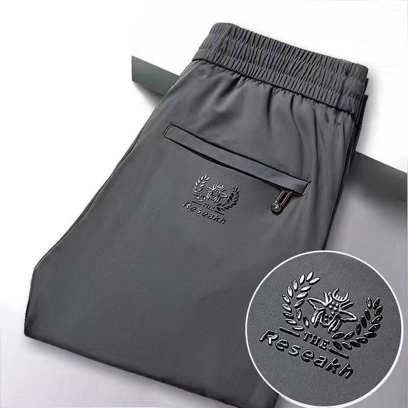 

Мужские повседневные брюки из эластичного шелка Ice Silk — удобная эластичная резинка на талии, свободные, тонкие, прямого кроя, подходят для мужчин среднего возраста и молодых людей. XL темно-серого