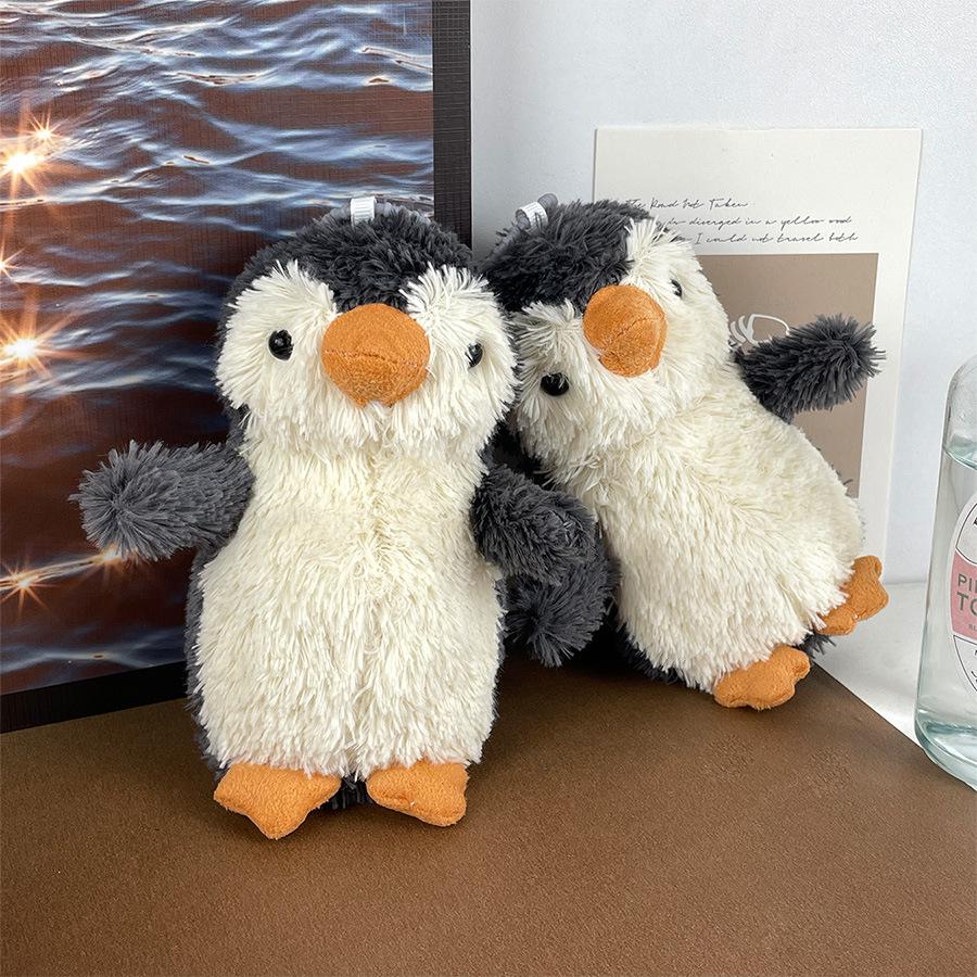 

Adorable Plush Penguin Toy - Cute Claw Machine Animal Doll for Kids Height 13cm