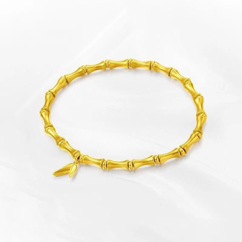 

Elegant Adjustable Golden Bamboo Bracelet for Women - Modern Chinese Style, Versatile Sectioned Design