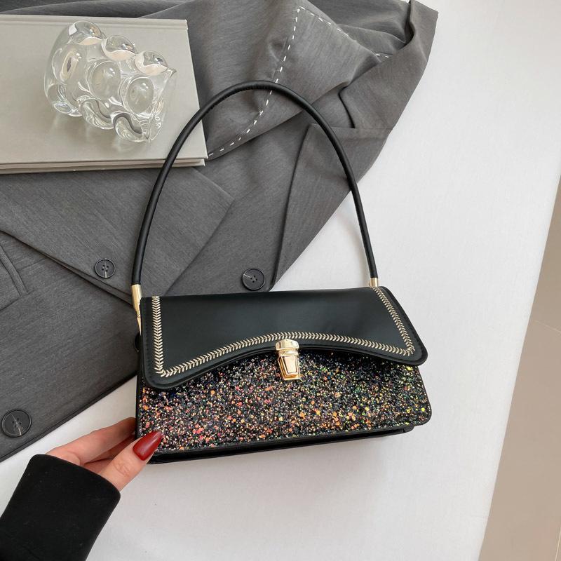 

Women s new women s bags are light luxury and versatile, contrasting colors, high-end temperament and appearance, portable shoulder armpit bag. чёрный