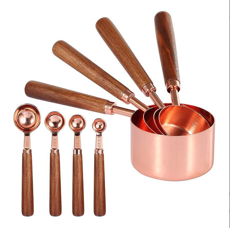 Gold-Plated Stainless Steel Measuring Cups & Spoons with Solid Wood Handles and Scale Markings for Baking.