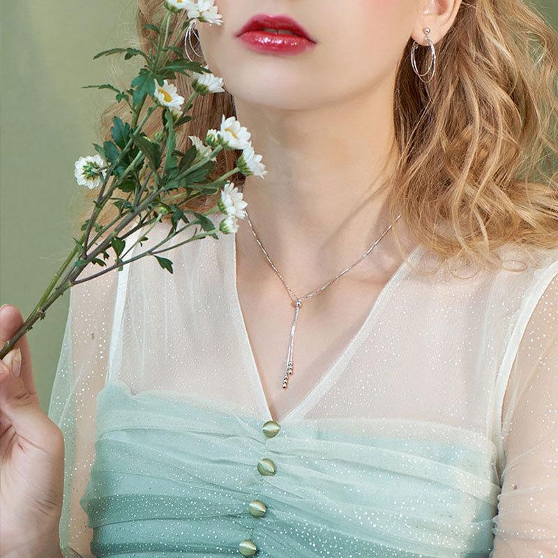 Einfache Damen Halskette mit Nischenperlen und Quasten für Damen-Schlüsselbeinketten, lässiger Stil, Geschenk