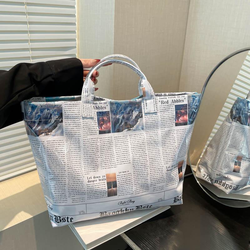 

Personalized newspaper bag 2025 new Korean version fashion printing trend women s large-capacity portable bucket bag хакі