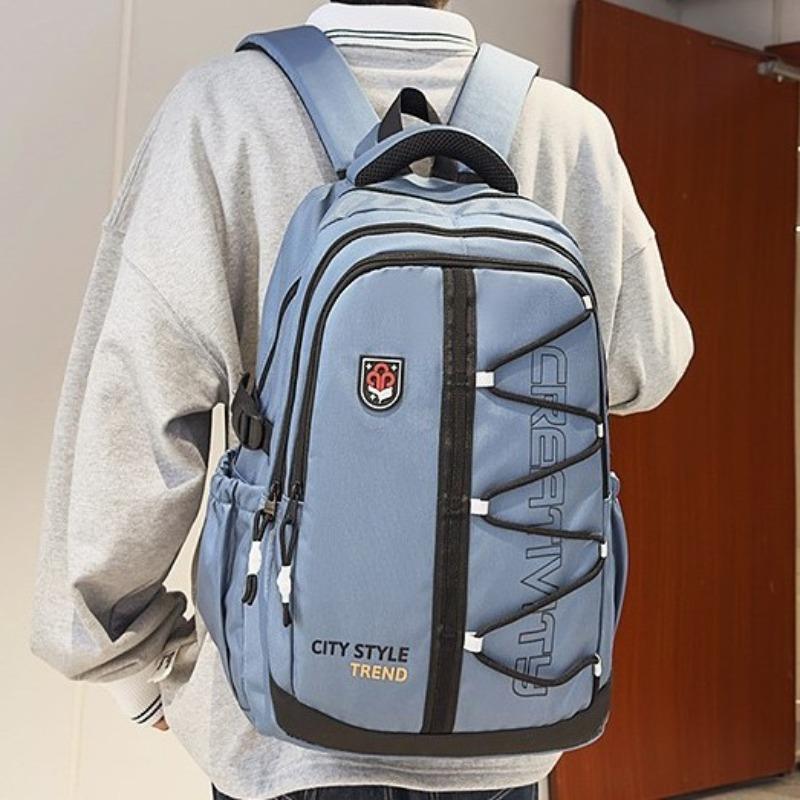 High-value retro tooling trendy and cool backpack for junior high school students, casual, simple, lightweight and large-capacity backpack.