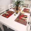 Festive Christmas Table Decor With Plaid Fabric And Embroidered Reindeer Design