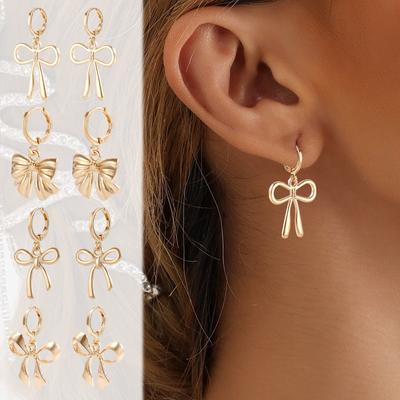 Brincos de laço dourado femininos, brincos fofos, pingente minimalista, brincos versáteis para encontros na praia e viagens combinando 1 par