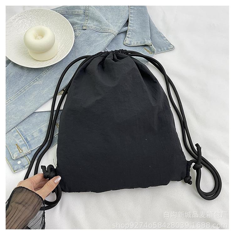 

Korean drawstring pleated bundle backpack casual large-capacity nylon bag 2025 new niche commuter backpack