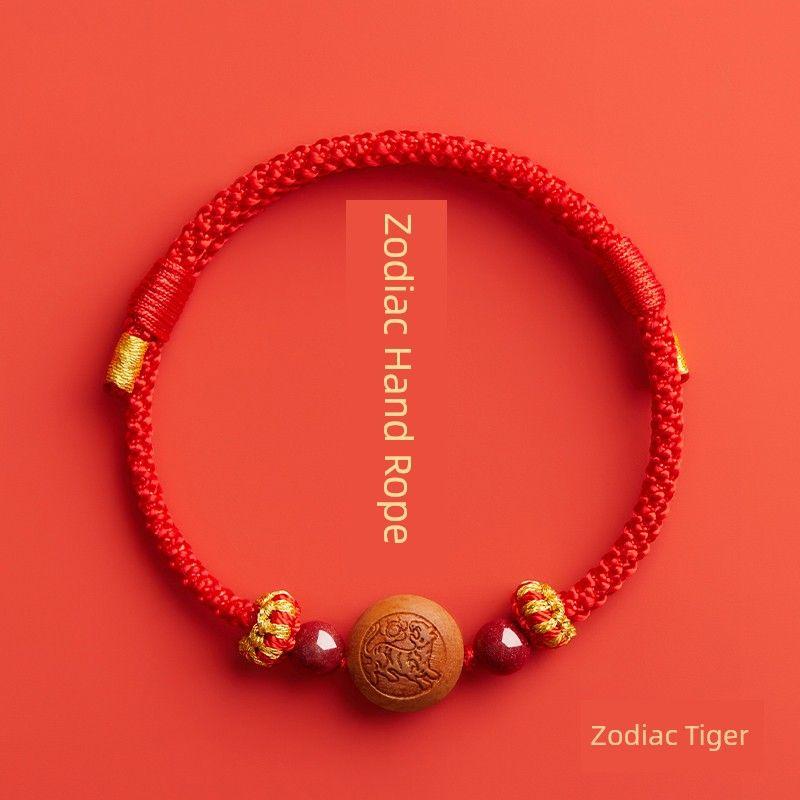 

Амулет из персикового дерева, детский красный веревочный браслет от испуга, браслет из грецкого ореха, безопасный ремешок для переноски новорожденного ребенка [Baby] zodiac Tiger red rope bracelet