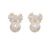 Premium super flash three-dimensional bow pearl stud earrings women's silver needle sweet literary temperament fashion stud earrings