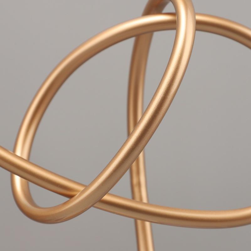 Metallskulptur Marmorsockel Geometrische Goldlinie Statue Wickelornamente Dekorative Figuren Heimdekorationszubehör