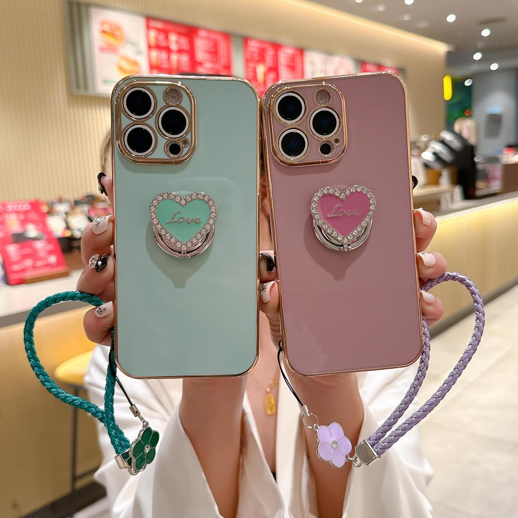 Luxury Wrist Strap Love Heart Stand Plating Camera Lens Protect Bumper Phone Case For iPhone 17 Air 16 15 14 Plus 13 12 11 Pro Max SE Girls Cute Cover