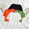 Women's Solid Color Crop Top - Slim Fit, Short-Sleeved, High Waist, Trendy Design.