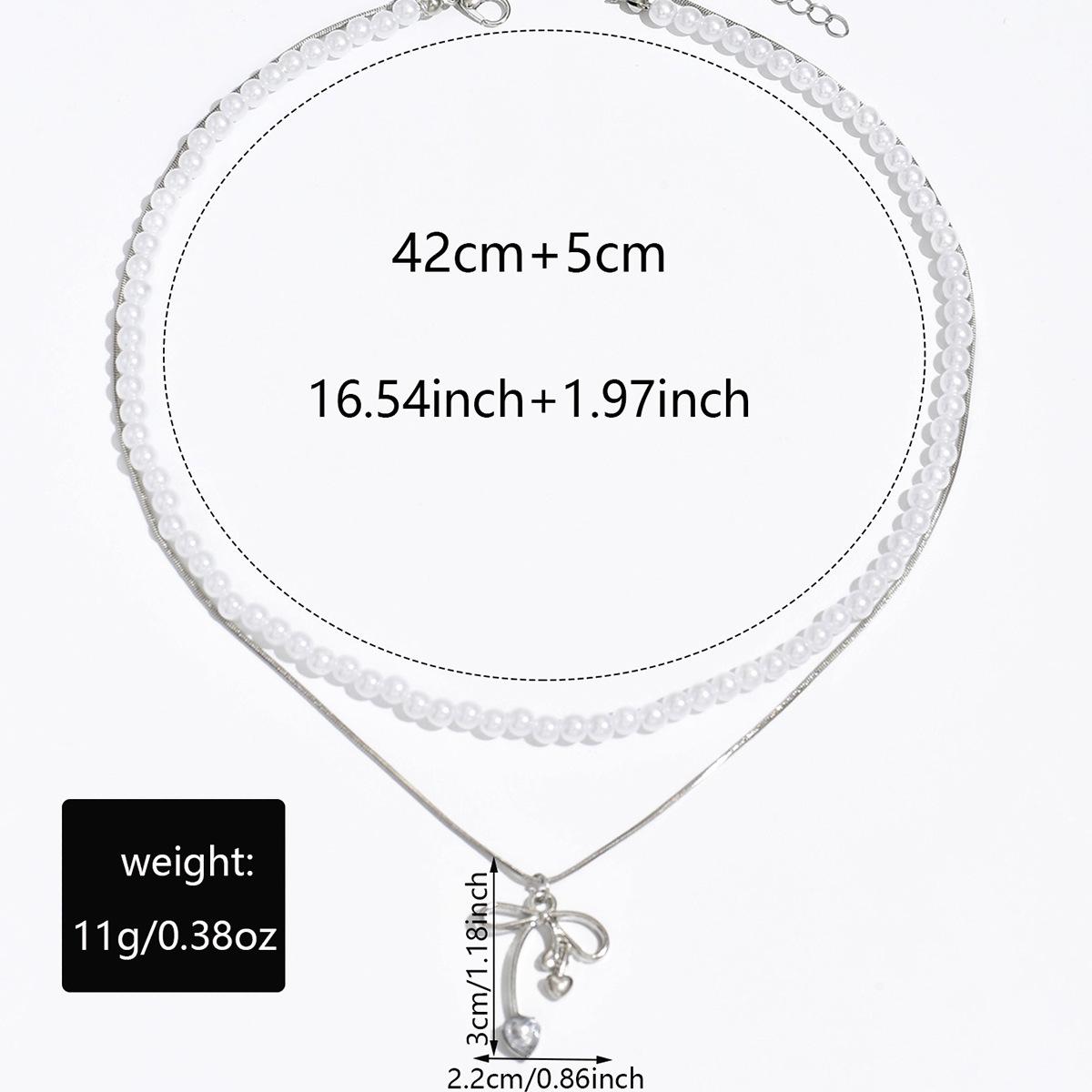 

French stacked pearl necklace European and American retro necklace light luxury high sense bow collarbone chain women