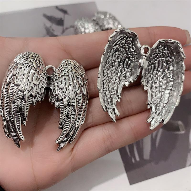 1 Stück Damen Flügel Autoanhänger Retro Metalltextur Engelsflügel Schlüsselanhänger Taschenzubehör Schmuck Geschenke für Freunde