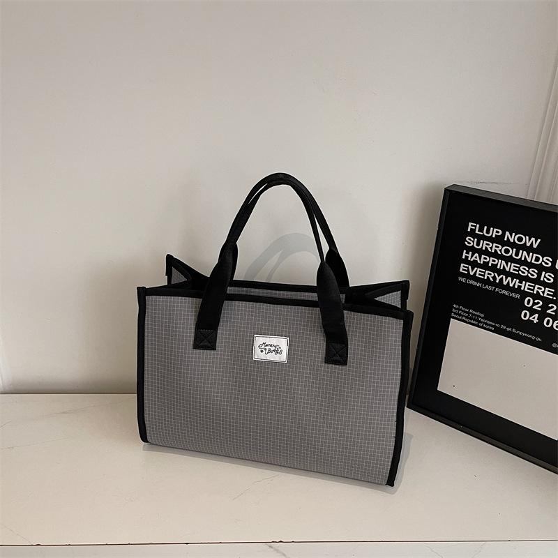 

Casual large-capacity plaid cloth bag, student commuter tote bag, casual contrasting color and texture messenger bag. сірий колір