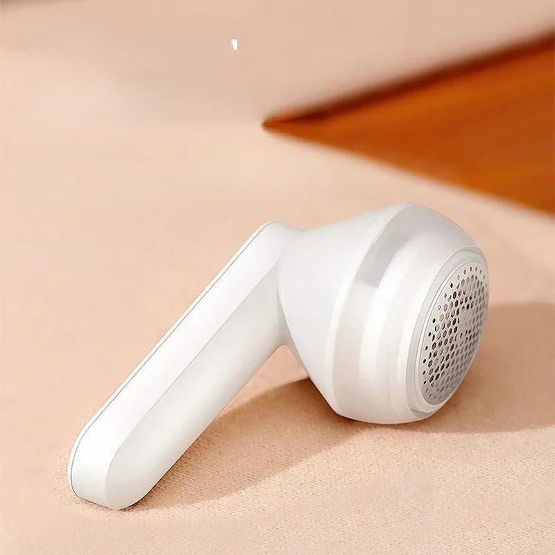 

Засіб для видалення ворсинок для одягу Електрична акумуляторна тканинна бритва Засіб для видалення пуху Кульки для волосся Засоби для видалення пуху з одягу Портативний білий