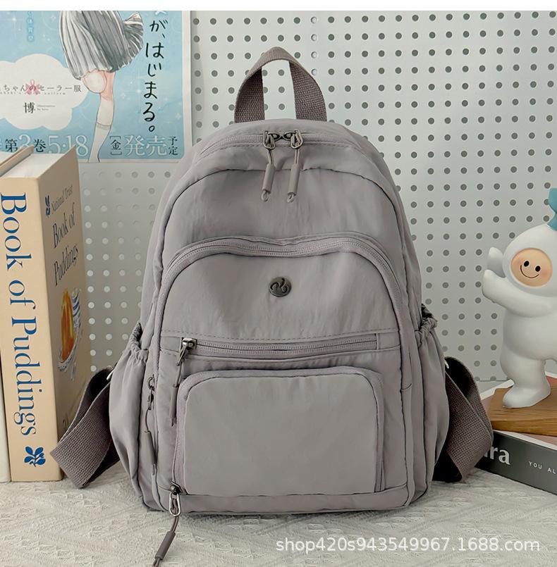 Schoolbag spot wholesale simple fashion backpack high sense niche women outdoor travel commuter small bag