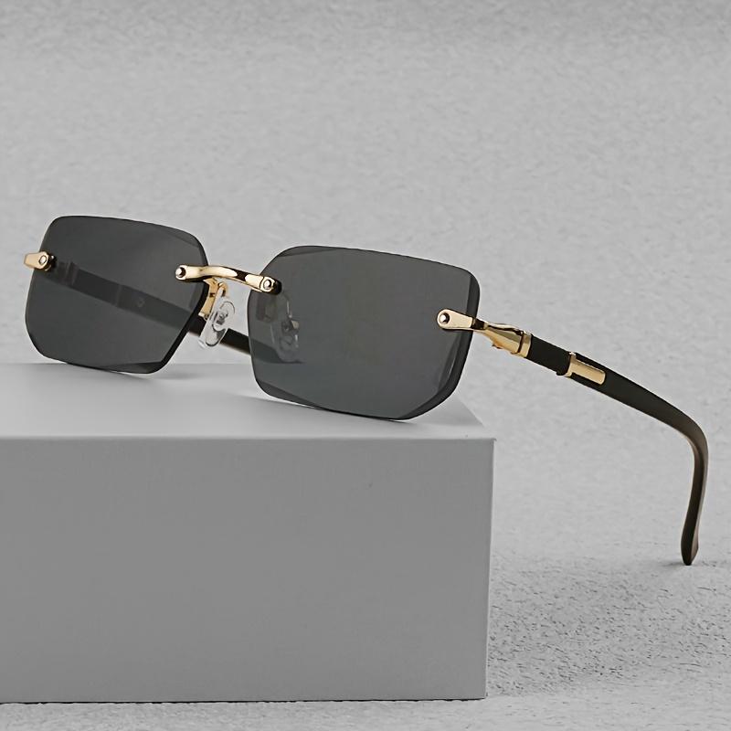 Stilvolle randlose rechteckige Modebrille für Männer & Frauen - Trendige schwarze Gläser mit goldfarbenem Metallrahmen