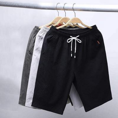 Shorts Homme Couleur Unie Taille Mi-haute Poches Taille Moyenne Séchage Rapide Cordon de Serrage Été Lacets Longueur Genou Streetwear