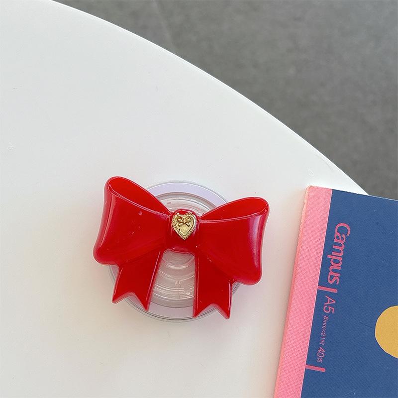 Small Love Three-Dimensional Bow Mobile Phone Airbag Bracket Magnetic Suction Telescopic Folding Desktop Bracket Wind