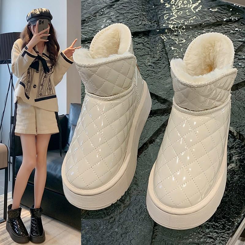 Autumn and winter snow boots women's 2025 new thick-soled thickened thermal cotton shoes with one foot pedal solid color short tube cold-proof boot