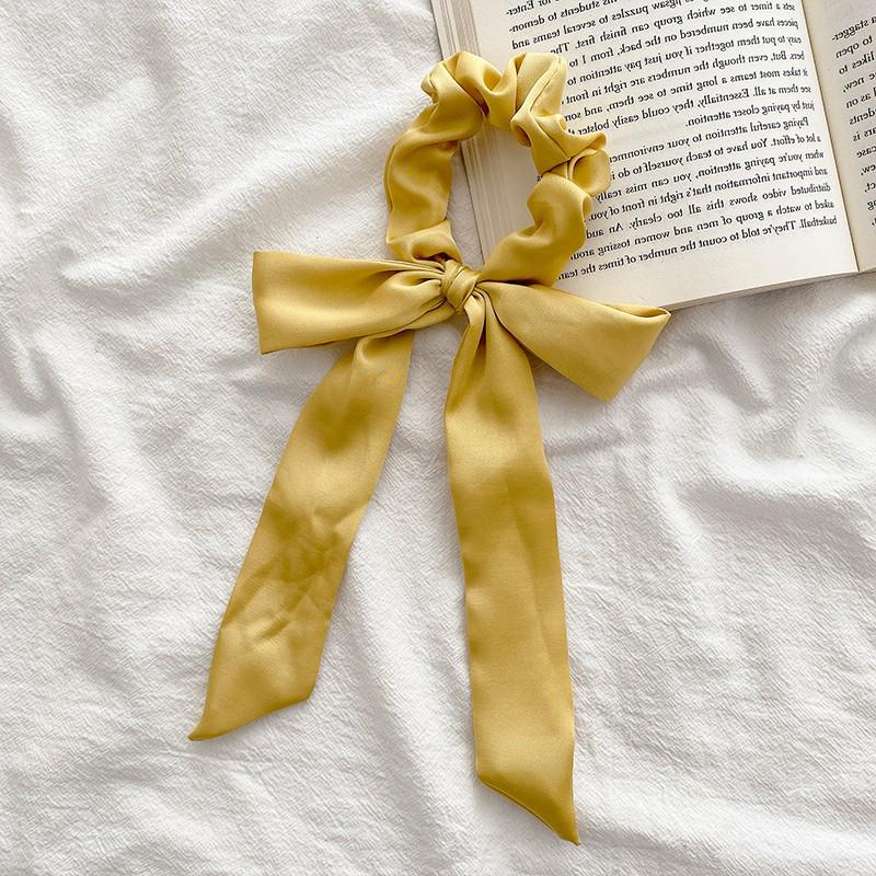 Elegant White Bow Headband with Long Ribbon for Women