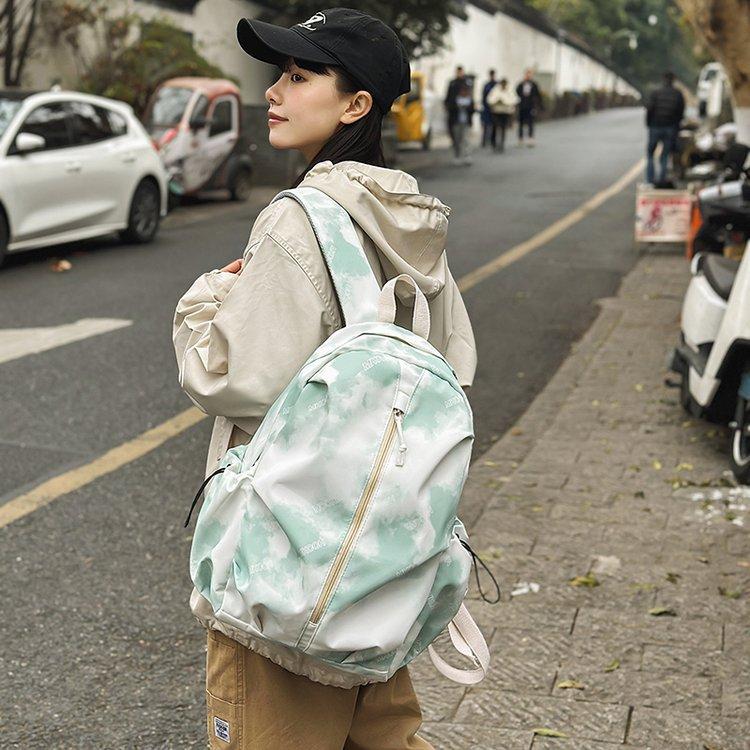 Schoolbag new Korean version of campus explosion simple and versatile lightweight student backpack college student junior high school shoulder travel