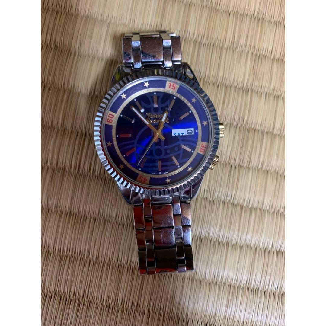 Used Quartz watch blue dial star index