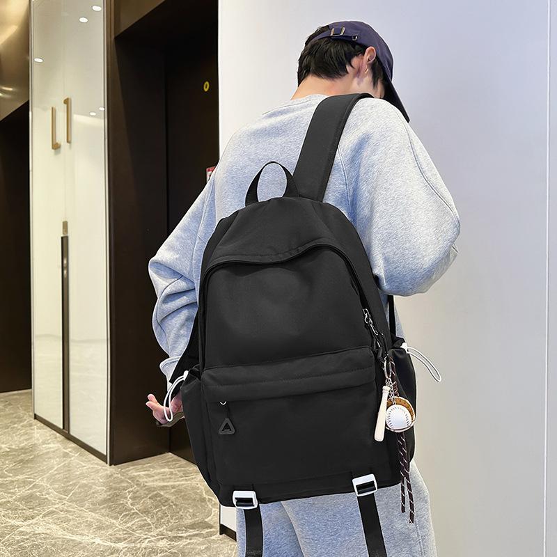Schoolbag1011 new versatile black schoolbag male college student large capacity backpack female junior high school girl solid color backpack